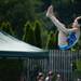 A diver tucks and somersaults during the Washtenaw Interclub Swim Conference Championships on Monday, July 22. Daniel Brenner I AnnArbor.com